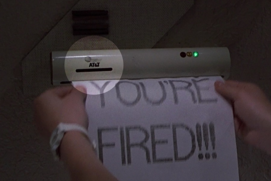 <p><strong>Figure 1.6</strong> When 2015 Marty is fired from his job, the AT&T logo is visible on one of the fax machines delivering the message.</p>