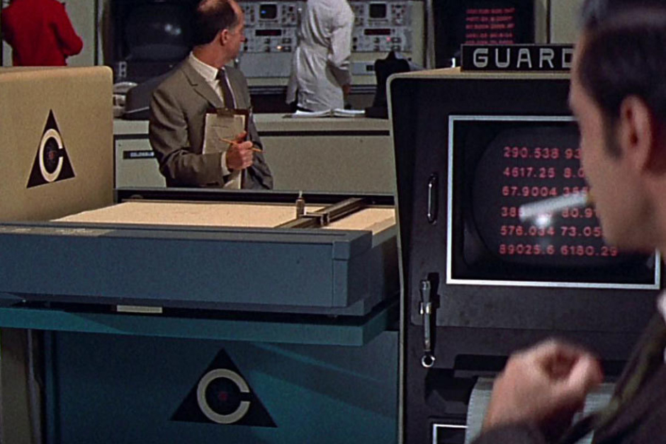 <p><strong>Figure 4.10</strong> On the side of a drafting table between the Colossus and Guardian computer terminals.</p>