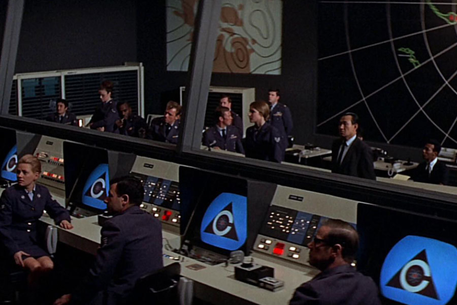 <p><strong>Figure 4.18</strong> On screens in the White House Situation Room, where people aren’t feeling so good about that decision to give nukes to an artificial intelligence.</p>