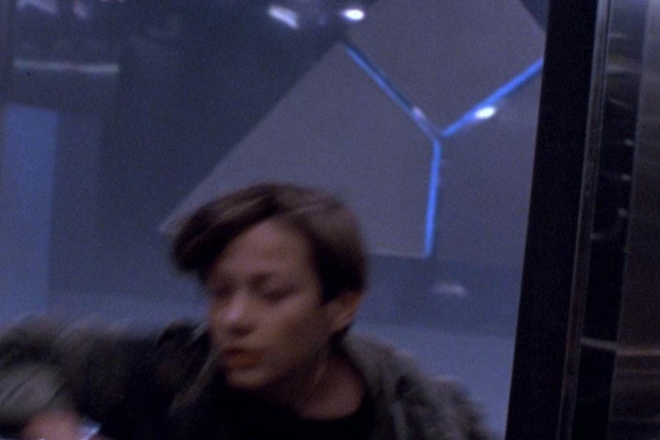 <p><strong>Figure 5.7</strong> As John Connor rounds the corner, we get a slightly clearer view of the mark, as it is backlit with blue light.</p>