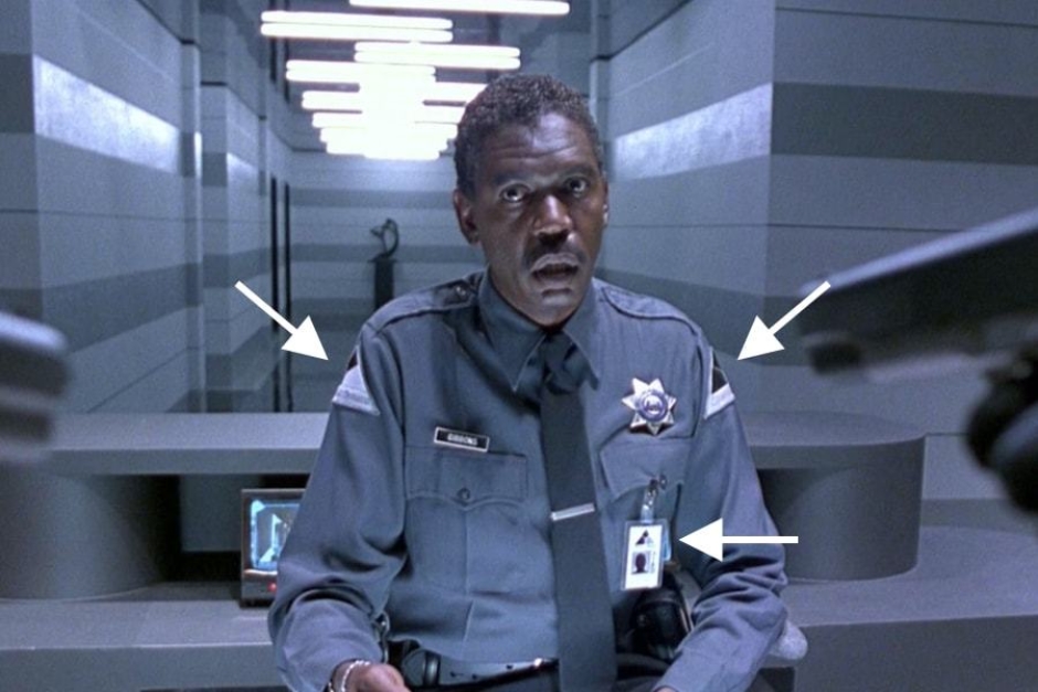 <p><strong>Figure 6.4</strong> Cyberdyne Systems security personnel wear uniforms with shoulder patch identification, that bears the company mark. They also carry employee identification cards.</p>