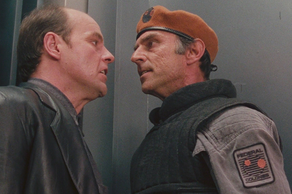 <p>The Federal Colonies military identity as worn by Captain Everett (right).</p>