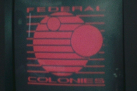 <p><strong>Figure 4.2</strong> Detailed look at the Federal Colonies logo as it appears on wall display monitors.</p>