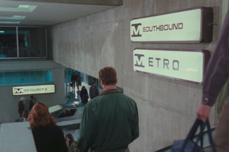 <p><strong>Figure 1.1</strong> Metro wayfinding signage seen as Quaid descends stairs.</p>