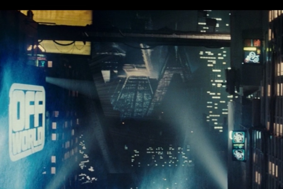 <p><strong>Figure 3.2</strong> On the left, we get a closer look at the Off-world logo signage, as the camera tracks Deckard and Gaff's ascent in the Police Spinner.</p>