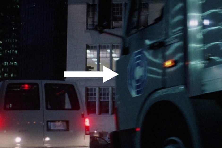 <p><strong>Figure 3.7</strong> In the scene where RoboCop arrives at the police station, we see the OCP logo on the sides of vans and a truck.</p>