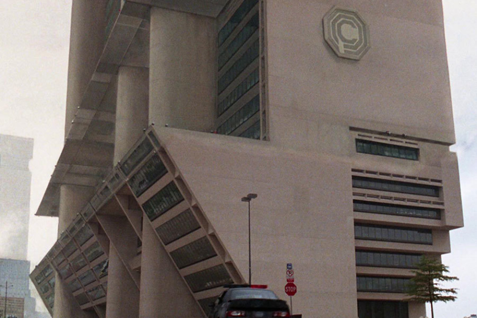 <p><strong>Figure 3.16</strong> On a lower part of the OCP corporate headquarters, we see the OCP mark applied to its Brutalist concrete facade.</p>