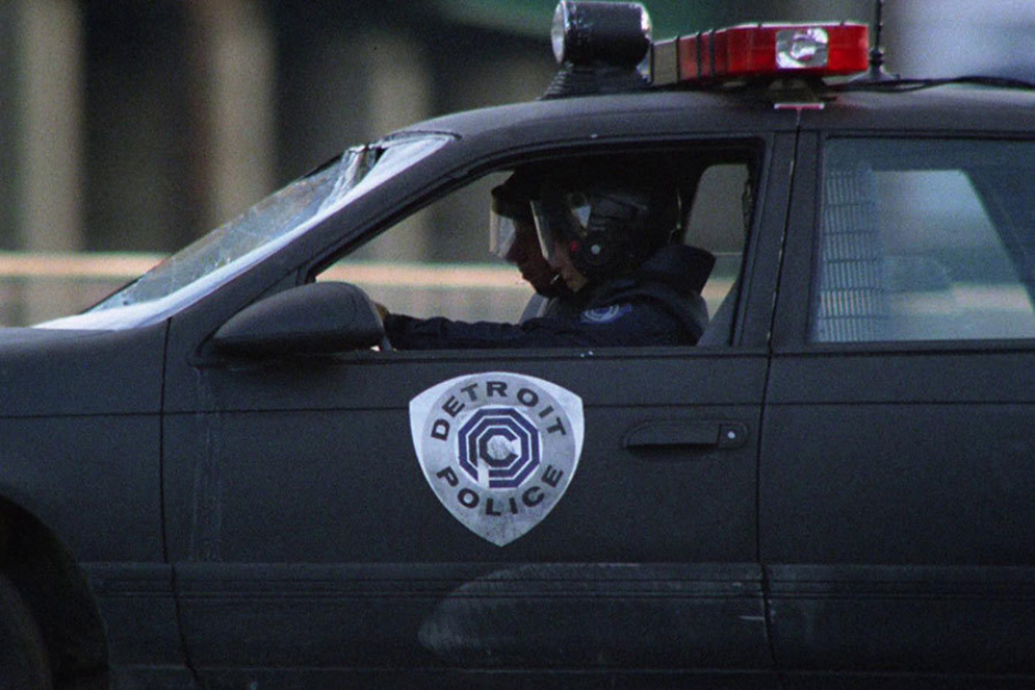 <p><strong>Figure 5.2</strong> A nearly straight on view of the OCP Detroit Police shield, as it appeared on the side of a police car.</p>