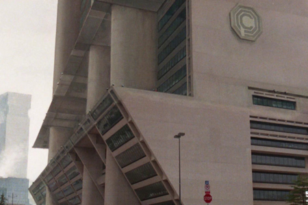 <p><strong>Figure 1.7</strong> OCP’s logo reproduced (inaccurately, if you’ll note where the descender on the P drops) in stone/concrete and applied to the exterior facade of its hi-rise corporate headquarters.</p>