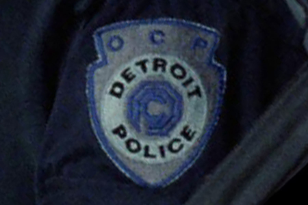 <p><strong>Figure 4.2</strong> The OCP Detroit Police shield used as a uniform patch, modified in form to accommodate “OCP” above the shield’s logo/type lockup.</p>