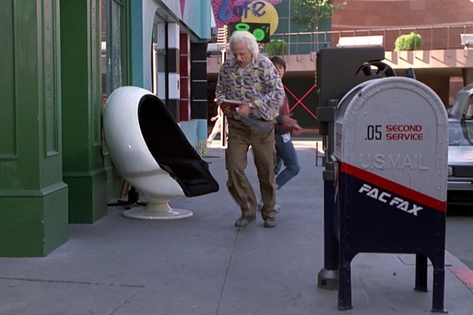 <p><strong>Figure 2.3</strong> The best view of the PAC FAX logotype and other typographic details is when Doc is taking Marty’s sports almanac to the trash.</p>