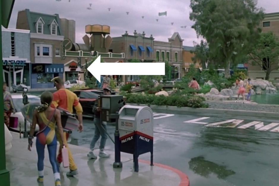 <p><strong>Figure 1.1</strong> As Marty takes in the future Hill Valley town square, the Pizza Hut logo of the future is spotted on a building facade.</p>