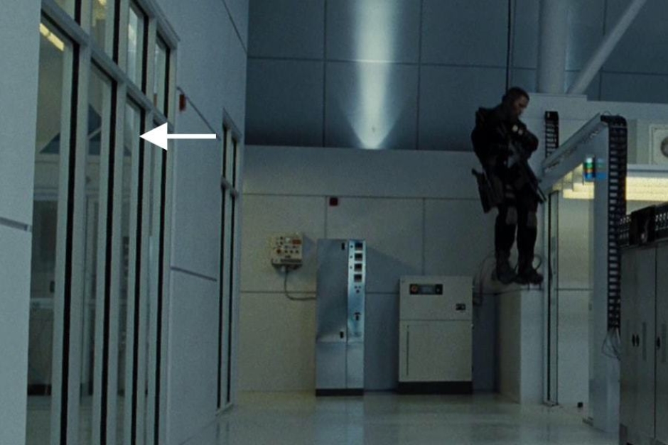 <p><strong>Figure 4.6</strong> As John Connor rappels into the Skynet facility, a large Skynet mark can be seen through the window to an the adjacent room. Source: <em>Terminator: Salvation</em></p>