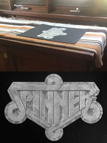 <p><strong>Figure 3.2</strong> Tom Southwell’s original pencil drawing of the Spinner emblem, that was presented and approved for use on the vehicles. Photos by Tom Southwell.</p>