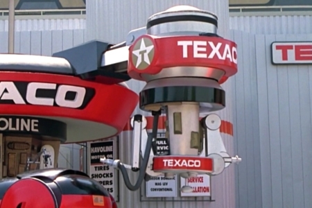 <p><strong>Figure 4.3</strong> The robotic Texaco attendant of the future, wears the star symbol and logotype up top on its cap, along with an additional logotype on the bottom around vehicle level.</p>