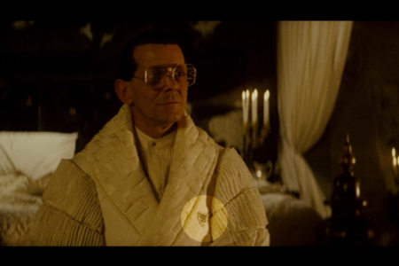 <p><strong>Figure 2.2</strong> When Tyrell is confronted by Roy Batty, the robe he wears carries a monogram owl mark — the only instance of the what is considered the Tyrell logo, that appeared in the film.</p>