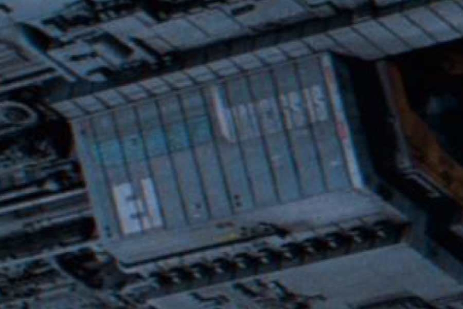 <p><strong>Figure 3.2</strong> The Weylan-Yutani logo can be seen on the underside of the Nostromo, where the shuttle is docked.</p>