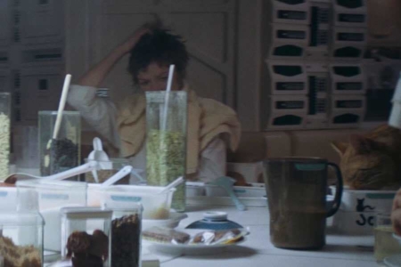 <p><strong>Figure 1.5</strong> In the scenes where the crew first gathers for a meal, we see the Weylan-Yutani wings applied to just about every container on the table.</p>
